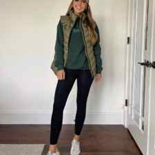Olive Green quilted puffer vest, green sweatshirt, black leggings, white casual sneakers
