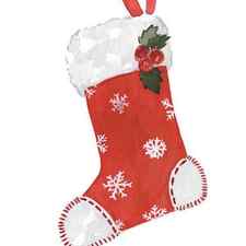 Red and white Christmas stocking with snowflake pattern decorated with holly by Joanna Szmerdt