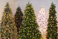 Four trees, in different sizes and colors, we tested to find the best artificial Christmas tree, fully decorated and lit.
