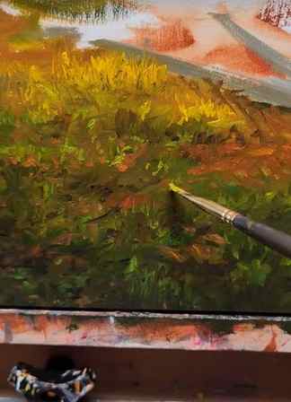 adding more color and detail using a dagger brush to achieve natural grass and foliage detail - oil painting