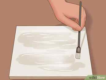 Step 5 Apply a thin coat of Modge Podge to the canvas, making sure to get even coverage.