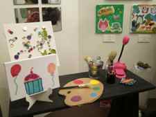 art gallery artist table with canvas