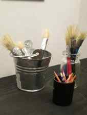 art gallery brushes and pencils