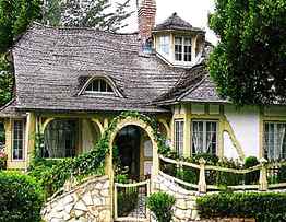 Little cottage in the woods, trees, archway, vines, flowers, cottage, yellow trim, rock HD wallpaper