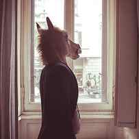 Horse Mask Man In Front Of Window by Eugenio Marongiu