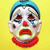 Mask of a Sad Clown by CSA Images