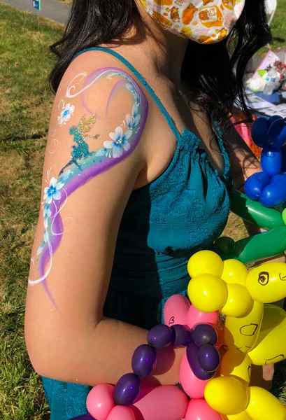 glitter tattoo and fairy arm paint by Auntie Stacey