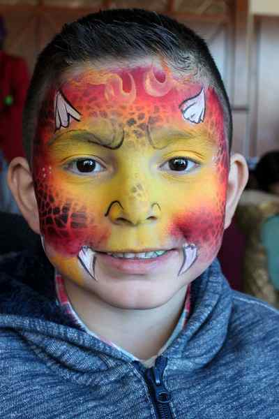 Fire Dragon face paint by Auntie Stacey