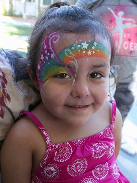 Rainbow Butterfly by www.auntiestaceysfacepainting.com SF Bay area face painter Auntie Stacey Dennick best face painter Marin county