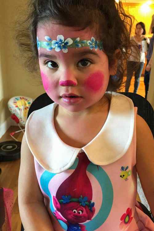 Poppy face paint Auntie Stacey