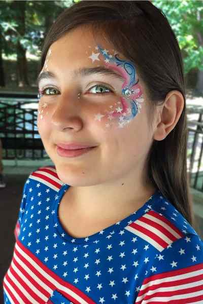 face painting by Auntie Stacey Sonoma county SF bay area face painter balloons July 4th eye bling