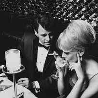 A Glamorous 1960s Couple Dining by Horn & Griner