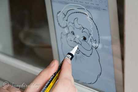 decorating Christmas windows with the help of an Ipad
