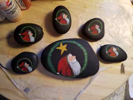 Use these Christmas santa rocks as inspiration to paint your own.