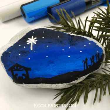 step by step tutorial used to create a nativity painted rock