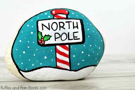 How to paint a north pole Christmas inspired rock with this tutorial