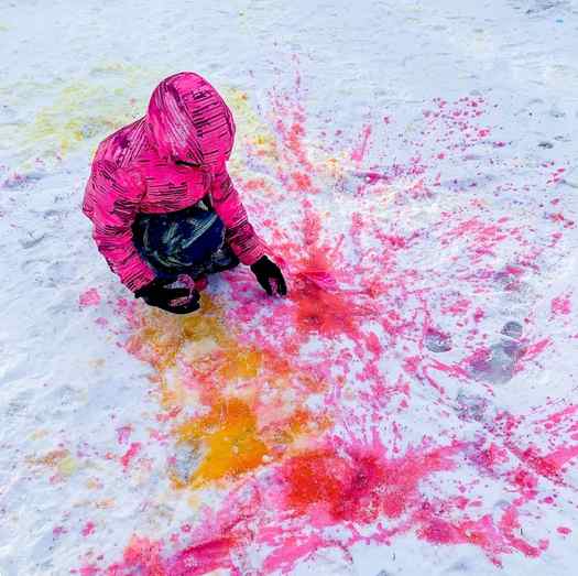 Image shows a kid playing with paint in the snow. Idea from Fun-a-day