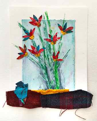Fabric scraps add texture to the acrylic paint skin collage