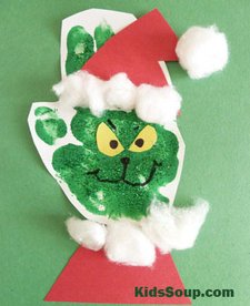 Grinch crafts- paint and glitter handprint grinch with red outfit and white fluffy cotton balls on green background