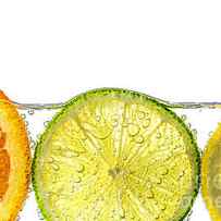 Orange lemon and lime slices in water 2 by Elena Elisseeva