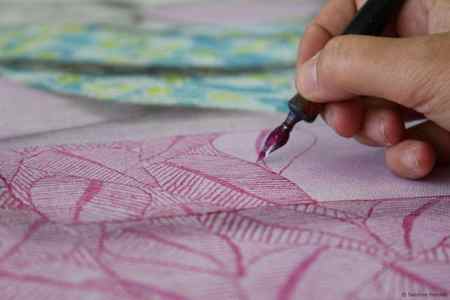 You can draw with pen and ink on a canvas surface.