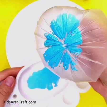 Painting The Bag-Using Plastic Bags to Form Bright Blooms - A Fun Crafting Idea For Kids 