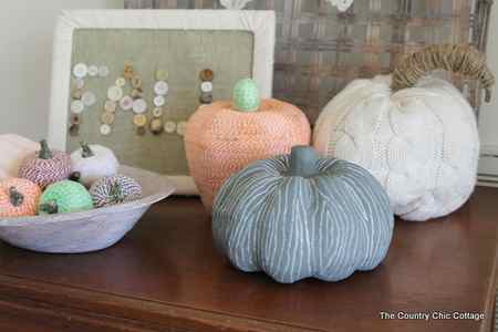 TEAL Wooden Pumpkins on a wood table