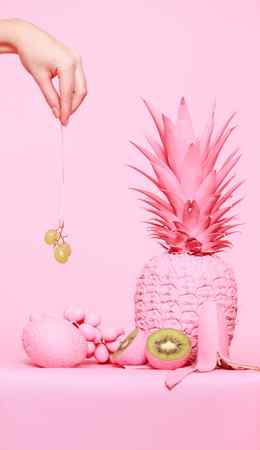 all pink image with hints of green on fruit