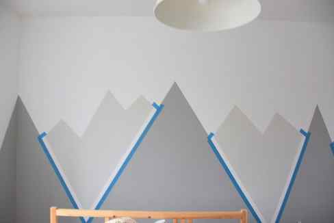 Looking for an amazing kids room or nursery decor idea? DIY this painted mountain range mural - easy and budget friendly! Perfect for a graphic, black and white, camping, adventure style room. Head on over to the blog for the full how-to tutorial. 