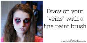 Draw Your Veins Using Black Face Paint and a Fine Brush - Zombie Makeup Tutorial Halloween Face Painting