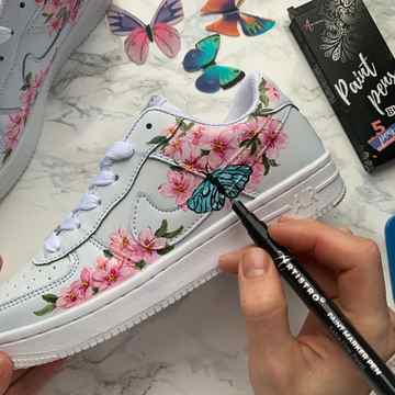 Sneakers with butterfly-paint marker ideas-paint pen art ideas-paint pen ideas-pen decorating ideas
