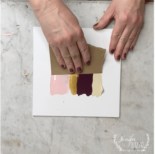 Pull paint across the canvas to make a DIY Pulled Paint Abstract Painting