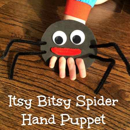 Easy crafts for kids can be puppets like the one shown. A black circle has 4 holes punched in it for a child