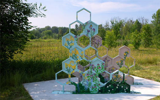 Public art installation of a hand-painted honeycomb