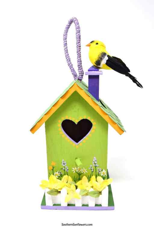 painted birdhouse spring craft using bright colors