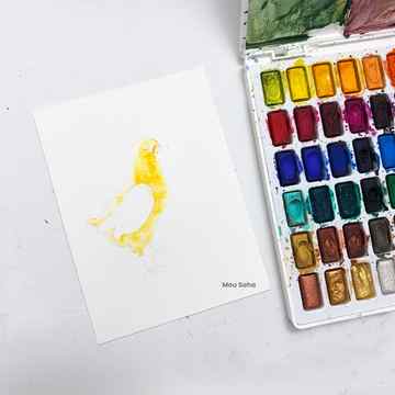 Watercolor pan with a watercolor chick