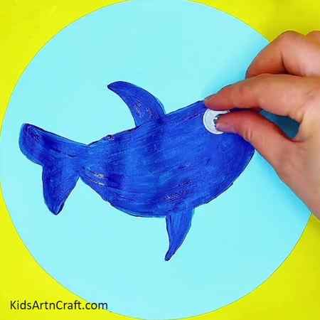 Stick googly eye with glue- Uncover The Techniques Of Painting Sharks Step-by-Step Tutorial