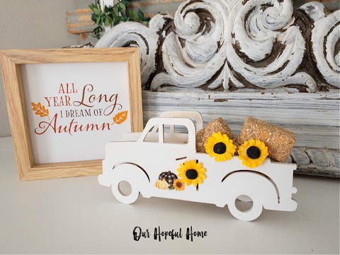 fall decor sign white truck hay bales sunflowers