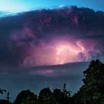 Lightning And Cumulonimbus Clouds by Stephen Burt/science Photo Library