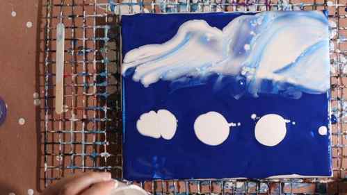 how to paint clouds with acrylic pouring in progress