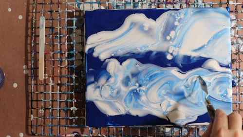 how to paint clouds with acrylic pouring in progress