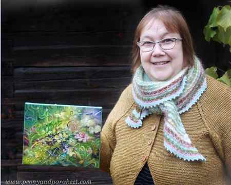 Paivi Eerola and her small rose painting.