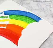 Make a Cloud From White Craft Foam to Glue on the Rainbow Painting