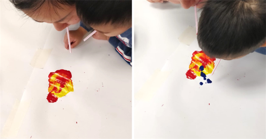 Two photos of a toddler and mother using straws to move paint around paper.