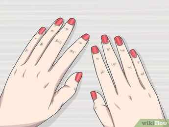 Step 7 Paint your nails red to create a bold statement.