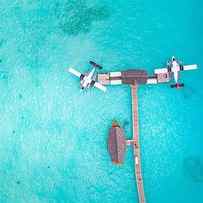 Beautiful Aerial View Of Maldives Jetty by Levente Bodo