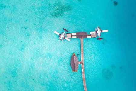 Wall Art - Photograph - Beautiful Aerial View Of Maldives Jetty by Levente Bodo
