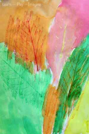 Fall art for kids - making leaf rubbings with crayons and watercolors