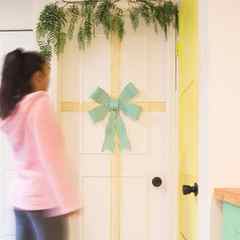 DIY Christmas door decorationsin modern farmhouse style! Dollar store budget home decor hack & creative decorating ideas with ribbons & paper!