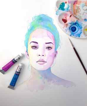 Watercolour painting of woman with blue hair and paints on table